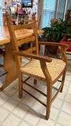 Exquisite custom built table and chairs……custom built in 1972 in Nicosia, Cyprus from oak(?). There are no nails except on the chairs to hold the rush seating in place. Chairs are hand carved…..one small blemish on table top