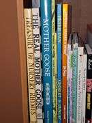 Bookcase and great grouping of children's books. Bookcase is 21.25 X 10.75 x 28.25 in tall. See all photos for titles.