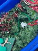 Tote full of Christmas decor and heavy duty tree stand
