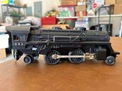 Selection of (2) Lionel Train pieces…..242 Steam Engine (with damage) and Lehigh Valley (L.V. 25000) red rail car