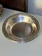 Very nice selection of silverplate items……compote, 2 small bowls, medium-sized bowl, rose bowl(?), and round serving tray