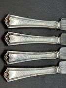 (4) Sterling Dinner Knives with Sterling handle and stainless blade……maker is not visible on back…..needs polished