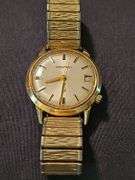Men's Bulova watch with 14 karat gold case. Watch is not working.
