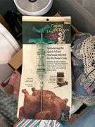 Tote full of miscellaneous household/kitchen items…..Food Network stemware, partial box of Rubbermaid storage containers, cutting boards and more