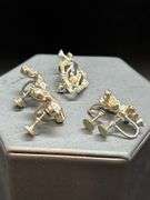 (4) pair of vintage screw-back earrings and (1) vintage brooch with pearl-like stone surrounded by clear stones