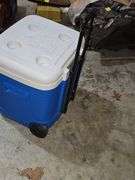 Igloo ice cube cooler on wheels.