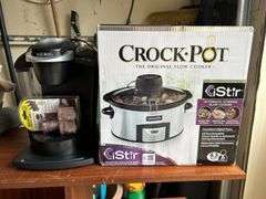Selection of (2) small kitchen appliances….Keurig single serve coffee maker and a NIB iStir Automatic Stirring Slow Cooker