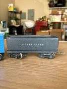 (2) Lionel Train Cars….Lionel Lines 3357 (missing an axle) and Lionel 1689T Tender