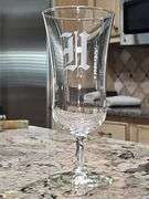 Cabinet of stemware. Matching set of 11 iced beverages, 11 wine glasses, 12 coupe champagne glasses. Matching set of 8 "H" monogrammed glasses, four shrimp cocktail stems with liners and more. See all photos.