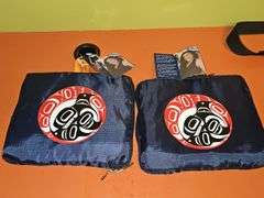 Two Holland America travel bags and a UT Vols bag