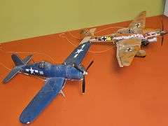 Model of a Vought F4U Corsair American fighter aircraft. (Missing right front wheel) Stuka-Junkers Ju 87, German dive bomber plane.