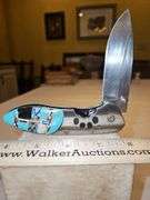 Two(2) large folding knives...