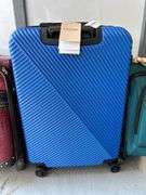 (4) pieces of various size luggage…..1 piece is NEW with tags
