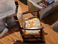 Wonderful vintage child's rocker with rush seat.