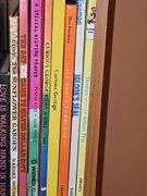 Bookcase and great grouping of children's books. Bookcase is 21.25 X 10.75 x 28.25 in tall. See all photos for titles.