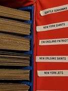 A grouping of football cards from the 1970s, sorted by teams.  See additional information and all photos.