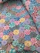 Antique full size hand stitched quilt…..quilt was made by seller’s grandmother