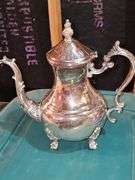 Tub of silver plate items. Two teapots, heated coffee pot, covered sugar, and creamer.