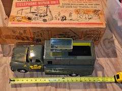 Vintage repair truck. All metal. Lift truck only. No other accessories or supplies in the box..