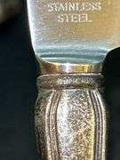 (4) Sterling Dinner Knives with Sterling handle and stainless blade……maker is not visible on back…..needs polished