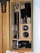 Telescope in wood case.