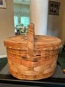 Nice looking lidded basket……16 x 12 x 10