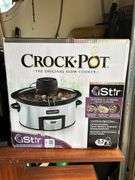 Selection of (2) small kitchen appliances….Keurig single serve coffee maker and a NIB iStir Automatic Stirring Slow Cooker