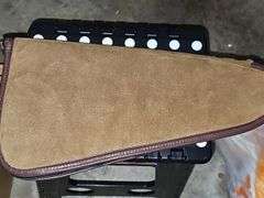 Leather handgun case 16 in long.