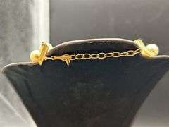 Nice looking double strand of pearl-like beads with adjustable fastener