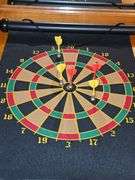 Magnetic dart board (missing 1 red dart), bobblehead Einstein needs battery, and mini Disco light works.