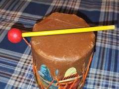 Little cowpoke leather chaps and vest in blue, natural leather color chaps, and pants with fringe and Teepee look on front, cowboy hat and drum.
