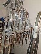 Five plunger type mole traps.