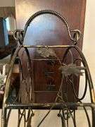 Unbranded Countertop Wine Bottle Rack with grape leaf side design…..13-1/2”D x 17-1/4” tall