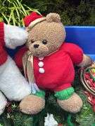 Tote full of Christmas decor and heavy duty tree stand