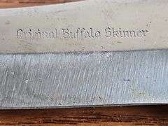 Original Buffalo Skinner knife from Silver Springs Florida with imitation bone handle and leather sheath.