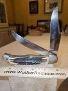 Two(2) large folding knives...