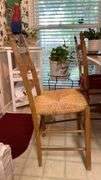 Exquisite custom built table and chairs……custom built in 1972 in Nicosia, Cyprus from oak(?). There are no nails except on the chairs to hold the rush seating in place. Chairs are hand carved…..one small blemish on table top