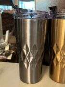 Selection of insulated drink containers and (1) glass sports bottle…..all are NEW and far right silver piece has a dent in the top and comes with carry case (see all pics as more were added) cups are by Primula