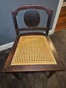 Vintage mahogany low back cane seat chair w/cushion...