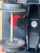 Lionel Trains Red Plastic Caboose…..needs cleaned from being stored in attic