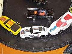 Vintage Hot wheel carrying case and cars as shown. One redline wheel in this grouping. Dukes of Hazzard car is Ertl.