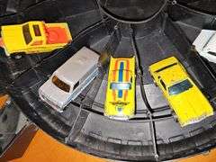 Vintage Hot wheel carrying case and cars as shown. One redline wheel in this grouping. Dukes of Hazzard car is Ertl.
