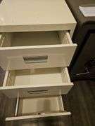 Three-drawer metal file cabinet...