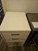 Three-drawer metal file cabinet...