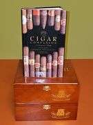 Two Sir Winston wood cigar boxes, cigar pen, and The Cigar Companion hardback book with dust cover.