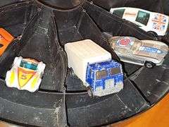 Vintage Hot wheel carrying case and cars as shown. One redline wheel in this grouping. Dukes of Hazzard car is Ertl.