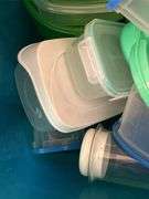 Tote full of plastic storage bowls