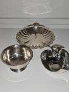 5 silver plate items. Chip and dip, Trey, nut and mint containers. Brass floral tray.