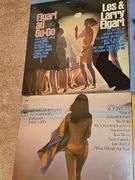 Grouping of albums by Percy Faith, Les and Larry Elgart, New Potato Caboose, Bud Shank, and more.