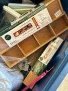 31 gallon tote and contents…..NEW King Size mattress protector, SubZero bottles, NEW kitchen gadgets and much more (no lid for tote)